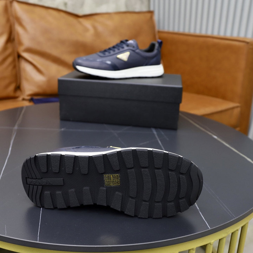 Prada Paneled Lace-Up Sneakers — detail