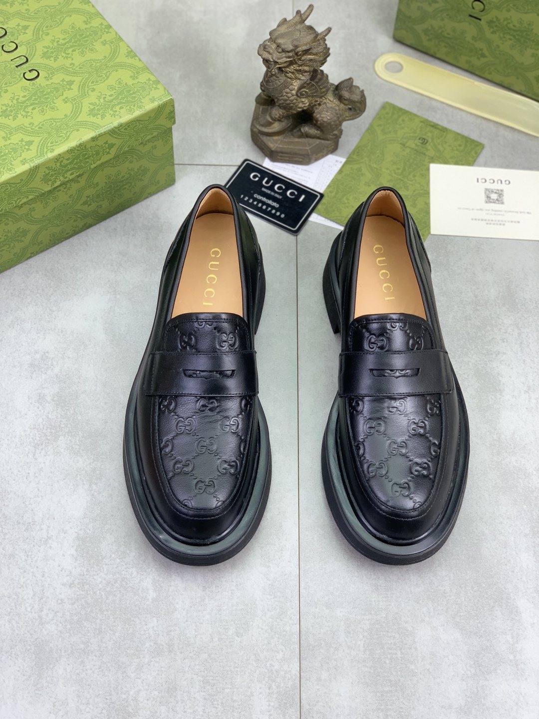 Gucci Black Embossed-Toe Loafers — hero